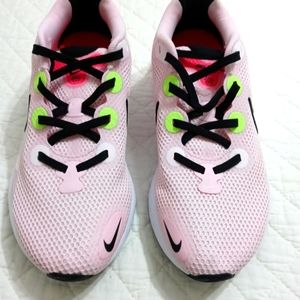 Womens Nike Renew Run light pink athletic shoes